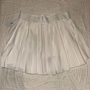 TnaMOVE Tennis Micro Skirt White Aritzia